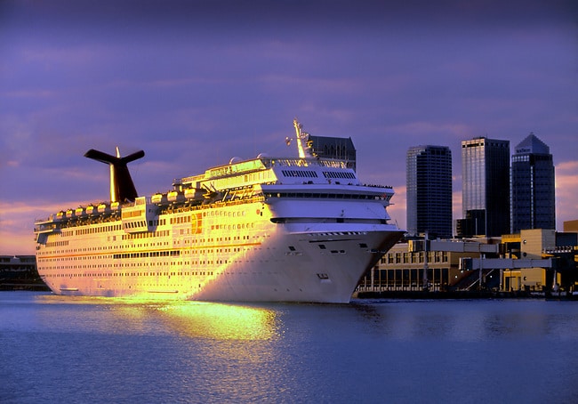 Cruise ship docked at Channelside Port at sunset in Tampa, Florida.